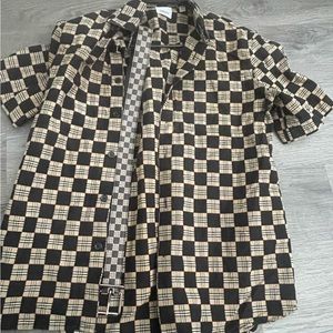 Authentic Burberry button up shirt with matching belt. Limited edition!!